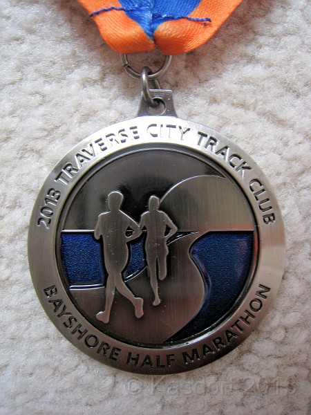2013 Bayshore Medal 05.JPG - Finisher Medal for the 2013 Bayshore Half Marathon. Traverse City Michigan. May 25, 2013